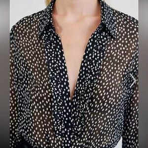 NILI LOTAN
Orian ruffle shirt